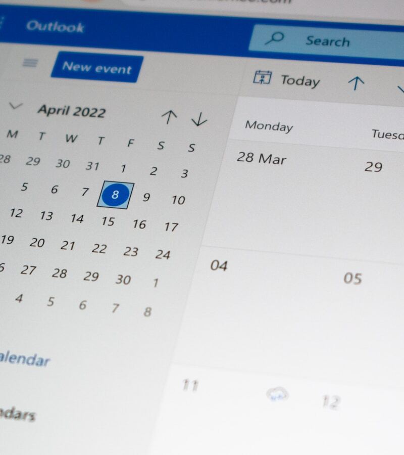 Close-up of an April 2022 calendar view within an Outlook interface, highlighting dates relevant